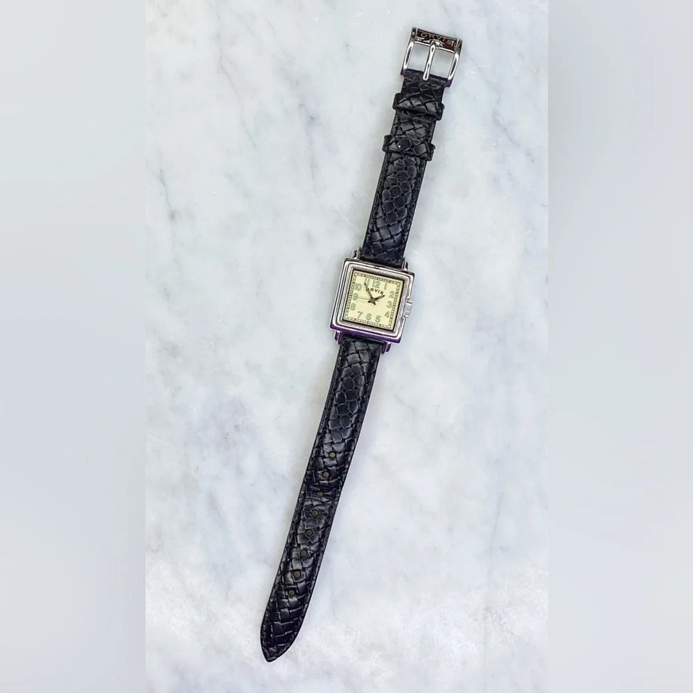 Orvis vintage women’s watch with black leather band